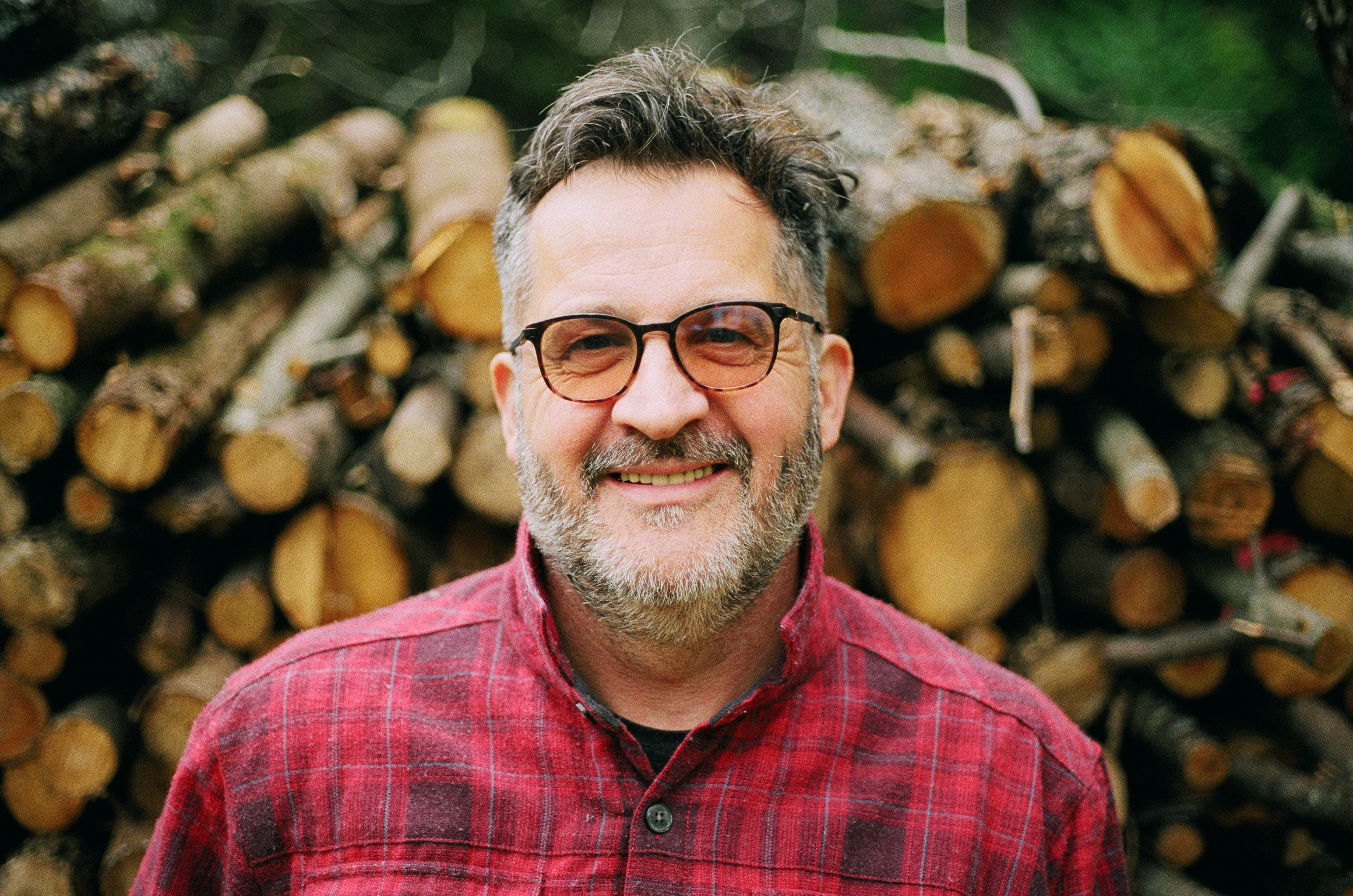 Paul Roberts, founder of Element Three and executive coach, smiling into the camera.